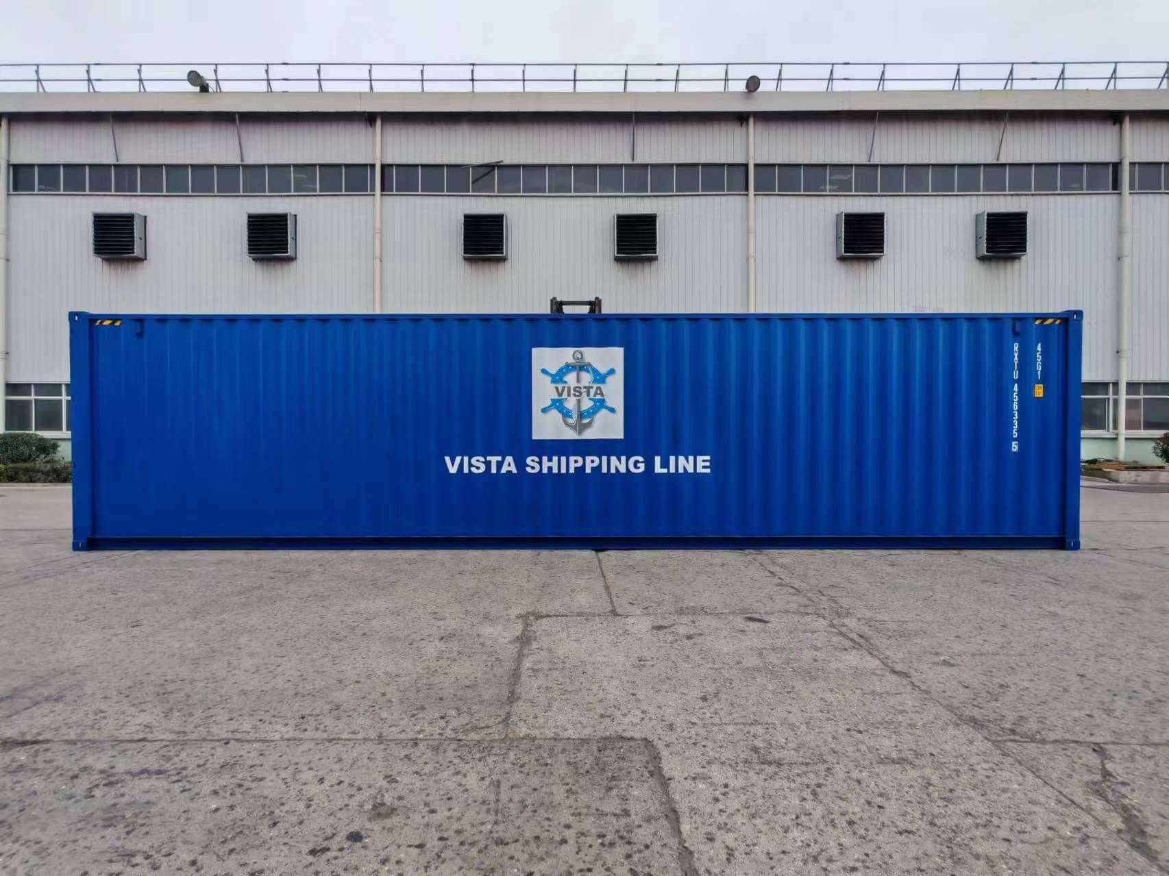 Shipping containers stacked at warehouse